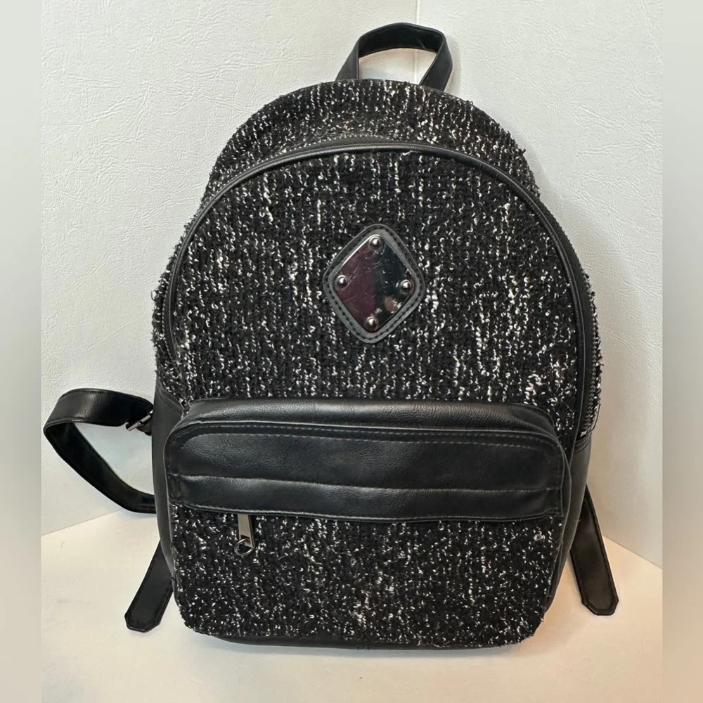Claire’s Black Woven Faux Leather and Fabric Backpack With Silver Hardware